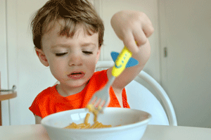 Child playing with food